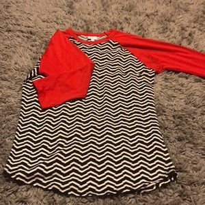 Red, black and white chevron shirt.